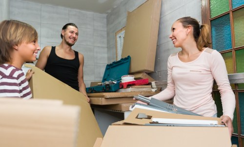Man and van removals service in Shooters Hill loading furniture