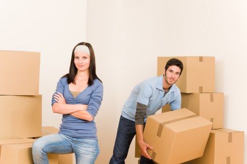 Movers handling a house relocation near Shooters Hill homes