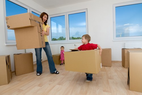Packed moving boxes and furniture ready for transport