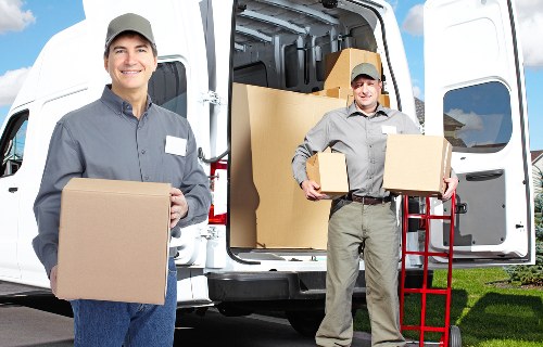 Careful unloading of household items at a new property